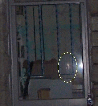 Mansfield Reformatory ghost hunt, face in  window 